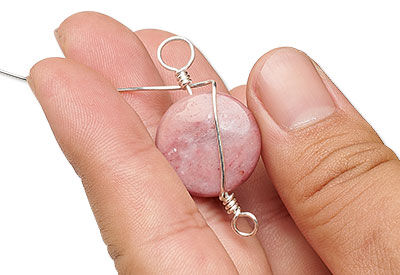 Wire being wrapped around bead